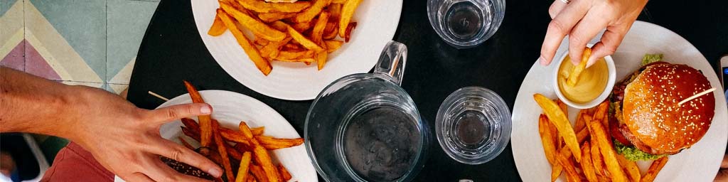 An overhead photo of a burger restaurant table